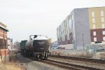 CBTX 736282 passing Old CNJ Station and Self Storage Building